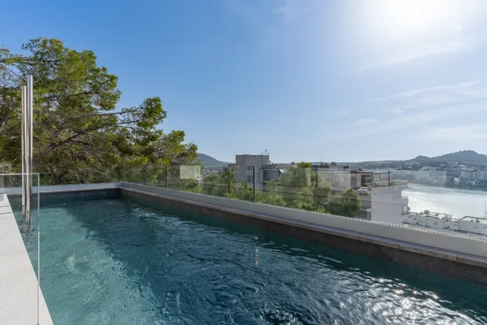 Rooftop swimming pool overlooking the bay and hills from the Santa Ponsa villa