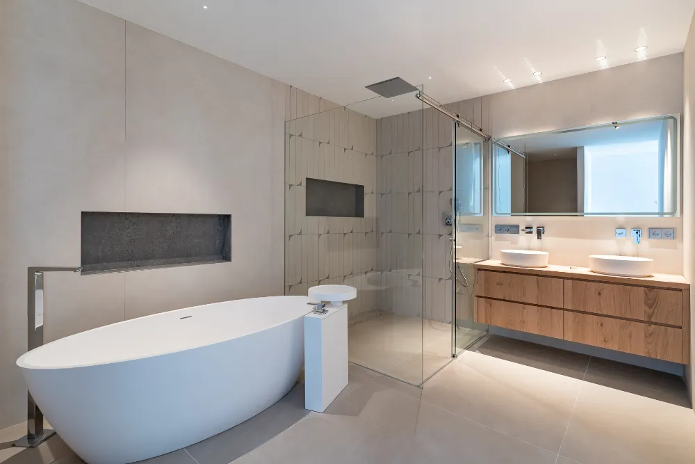 Modern bathroom with freestanding bathtub, walk-in shower and double vanity