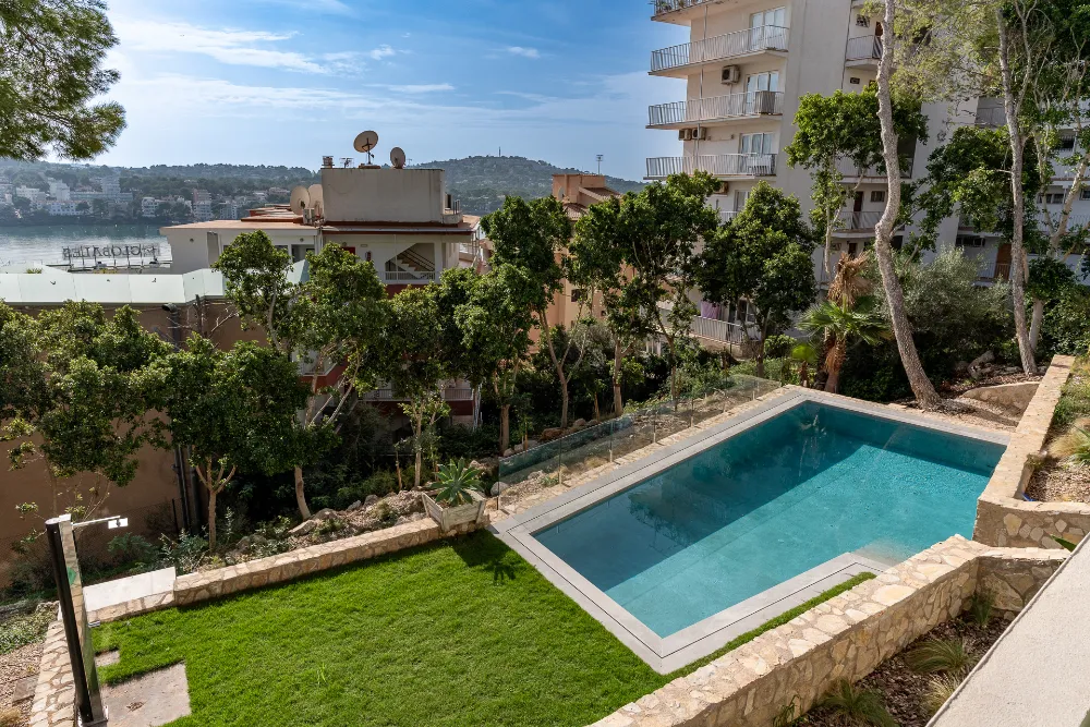 Swimming pool and lawn garden with views over Santa Ponsa surroundings